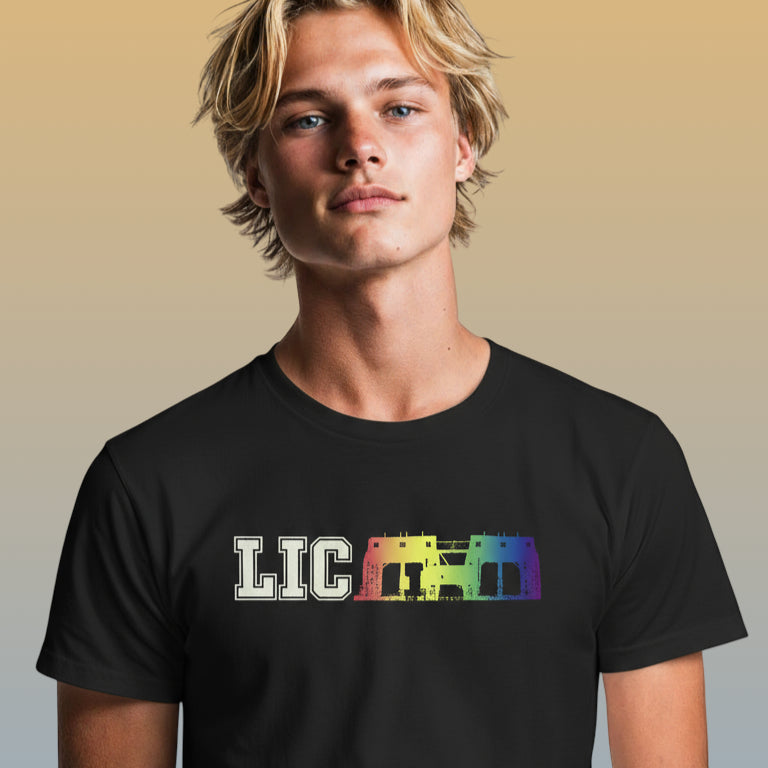 Man wearing a black t-shirt with colorful 'LIC' graphic on a beige background
