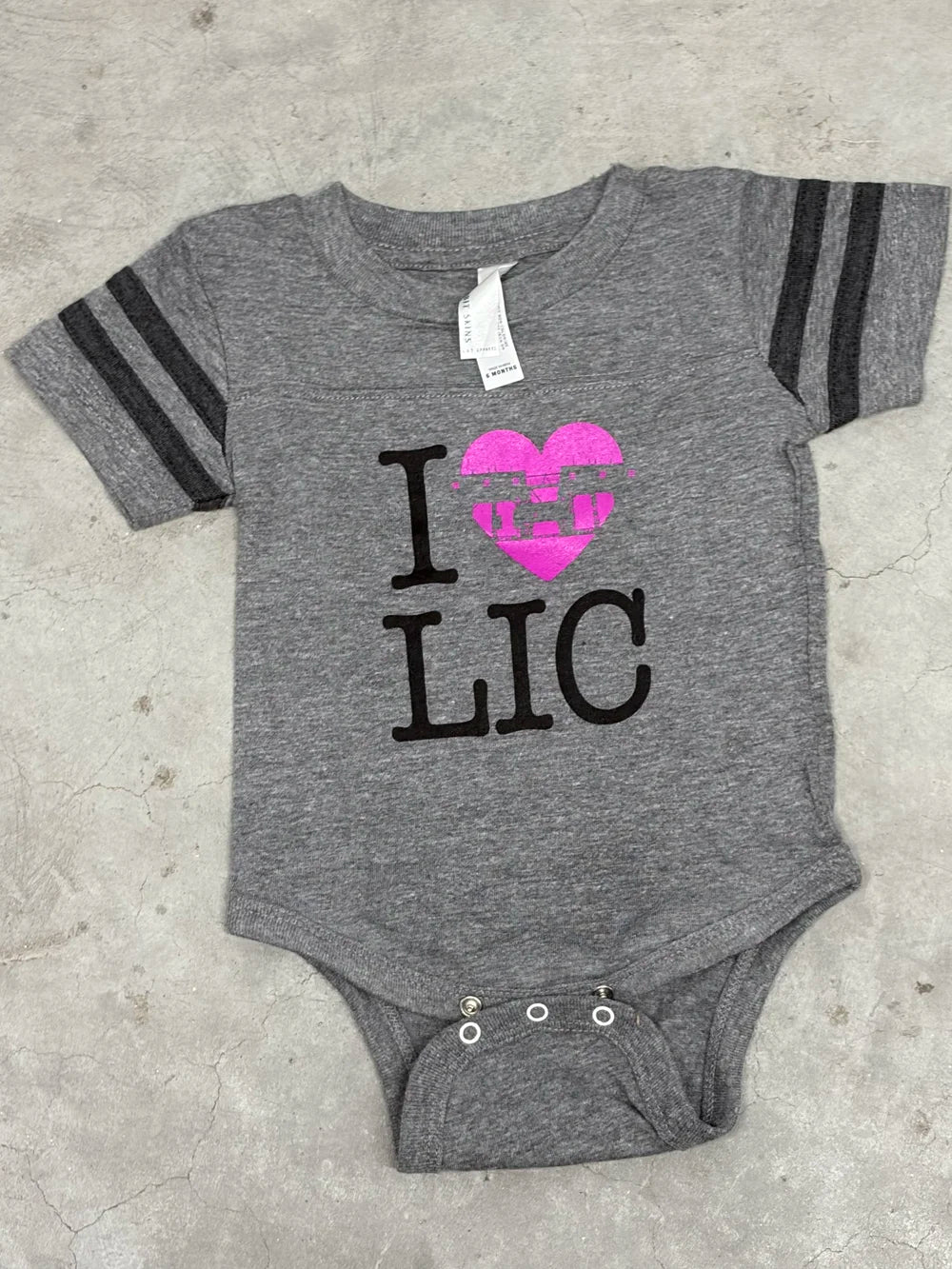 Gray baby onesie with 'I heart (in pink) LIC' print