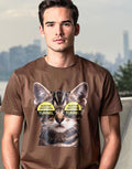 Man wearing a brown t-shirt with a graphic of a cat wearing glasses with Queens Midtown Tunnel text